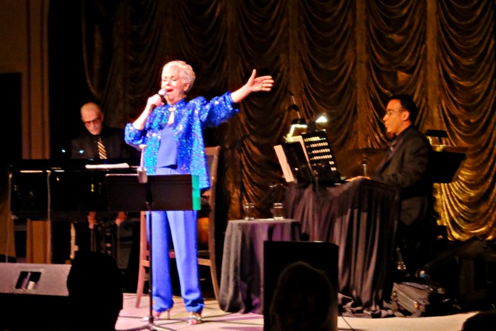 Mrs. Jones enchanted the crowd with numbers such as Till There Was You from The Music Man, People Will Say We're in Love from Oklahoma, and more. Shirley Jones in Concert | Concert Gala Recap Review by Sherri Tilley | Benefitting Dallas Area Rape Crisis Center and Women's Center of Tarrant County | Venetian Room | Fairmont Hotel | Dallas, Texas, USA